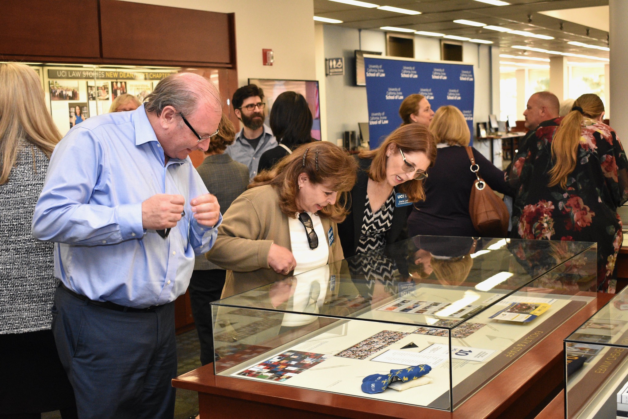 Guests looking at exhibit